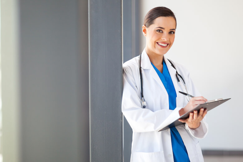 Family nurse practitioner holding a clipboard.