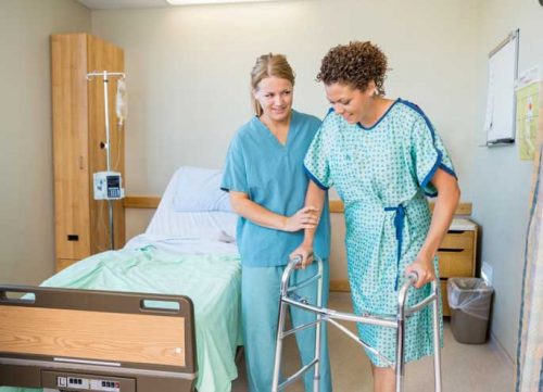 Nurse helps patient