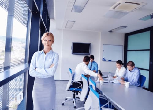 CNO standing off to side of boardroom