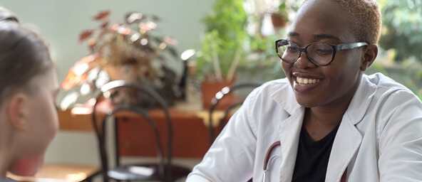 Medical professional with patient