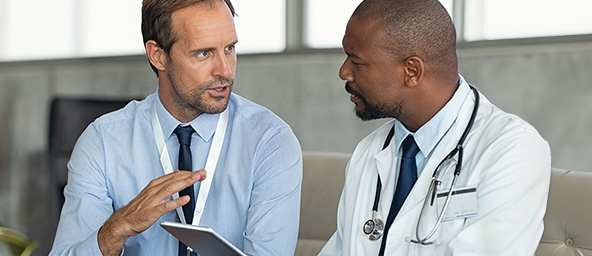 Two medical professionals talking