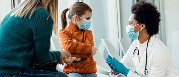Nurse Talking to Child