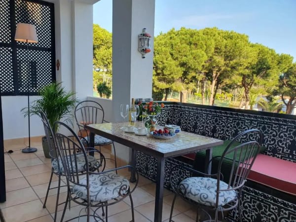 Marbella vacation rental - Large private terrace featuring premium outdoor lounge furniture with beautiful views of the pine trees and the Mediterranean sea