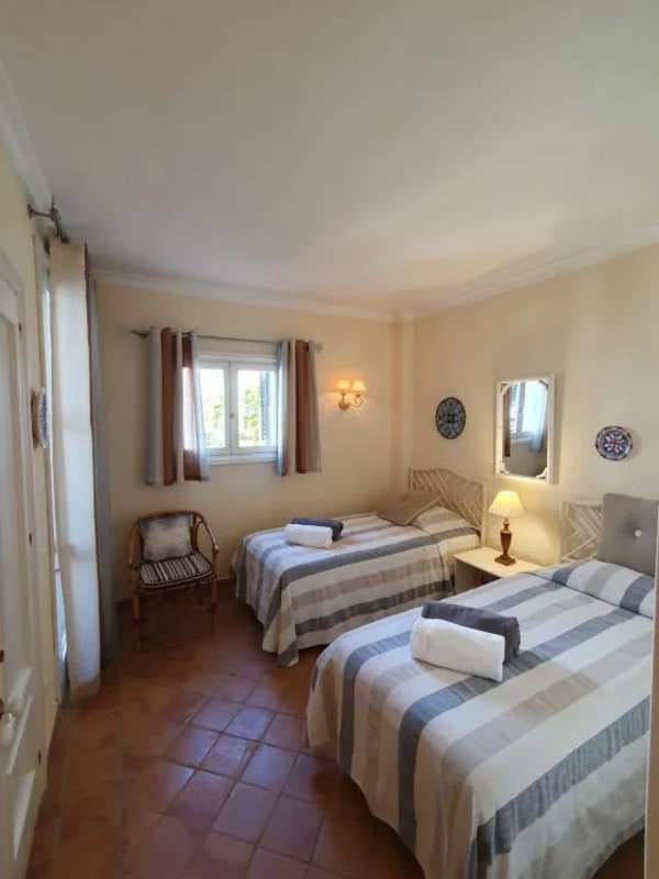 Marbella vacation rental - Stylish second bedroom with two comfortable twin beds and sophisticated interior design