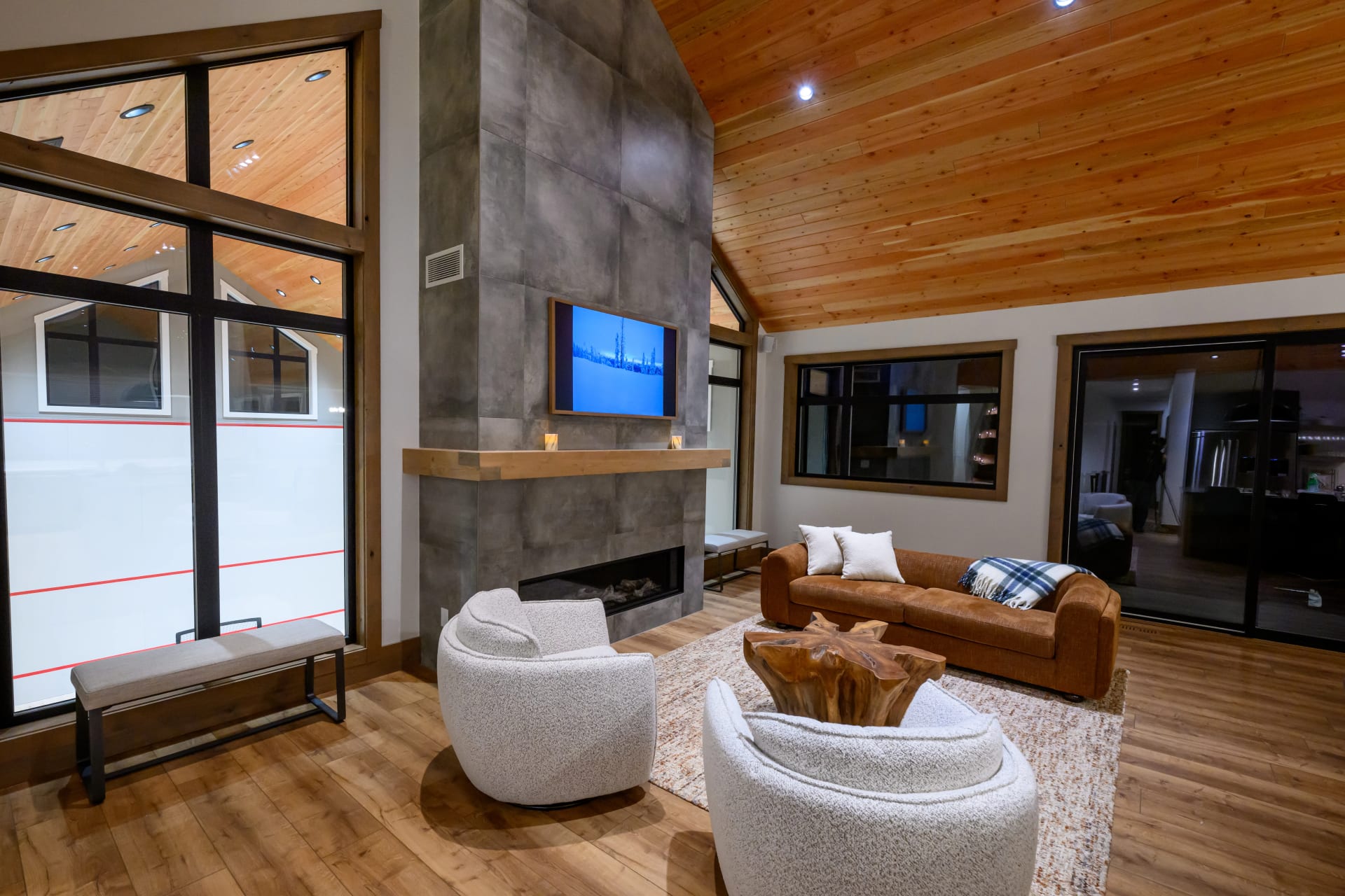 Main living room with fireplace and mountain views