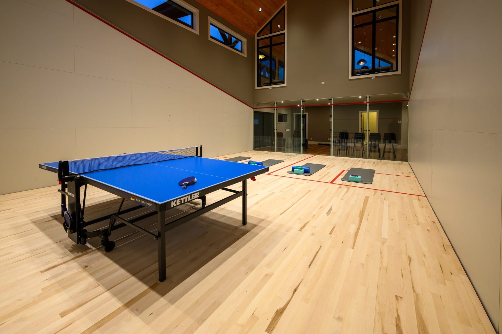 Indoor sports court with table tennis setup