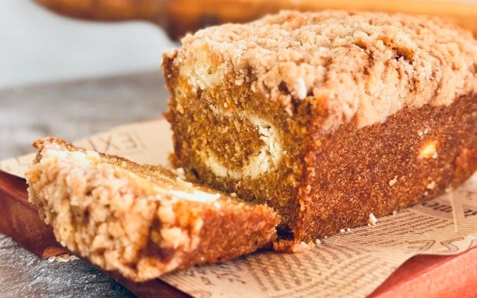 Moist carrot loaf cake with cream cheese topping.