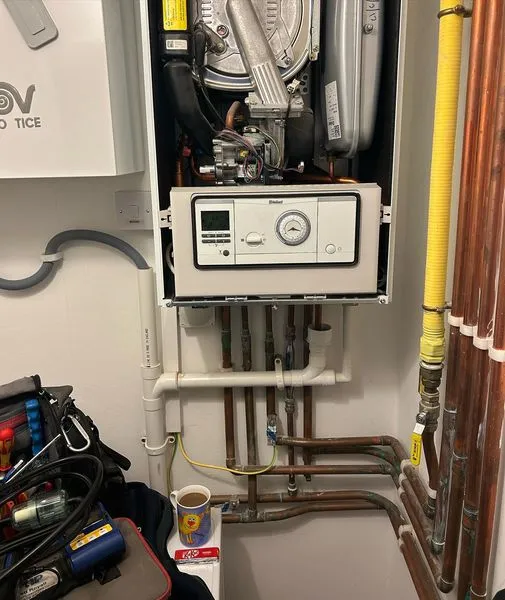 PHP Services team on a boiler installation in Hertfordshire