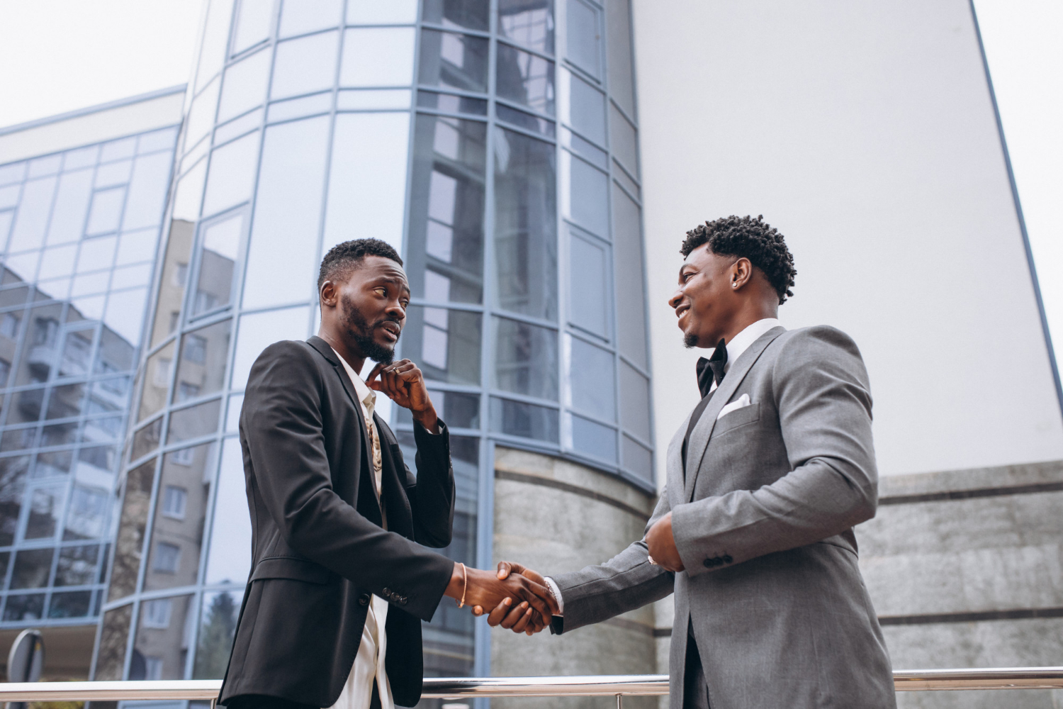 Two business partners shaking hands