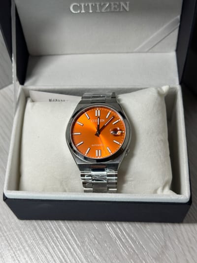 Reloj Citizen Tsuyosa Dial Naranja NJ0151-53Z, original con garantía