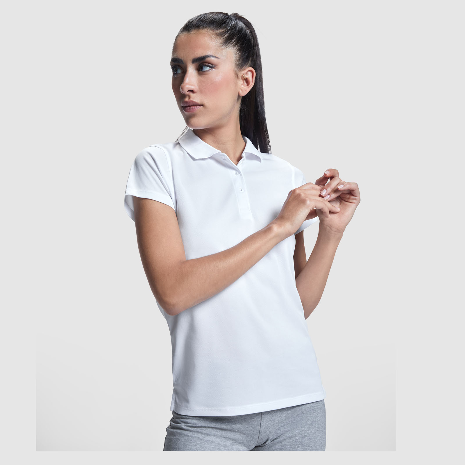Roly Polo de sport de 150 g/m² Monzha à manches courtes pour femme