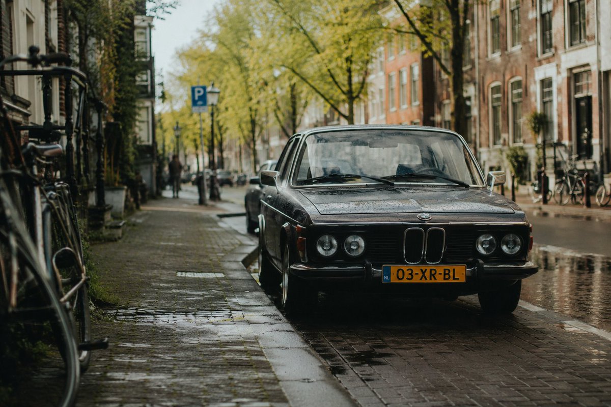 Rainy Dutch Street Vintage BMW AI image template preview