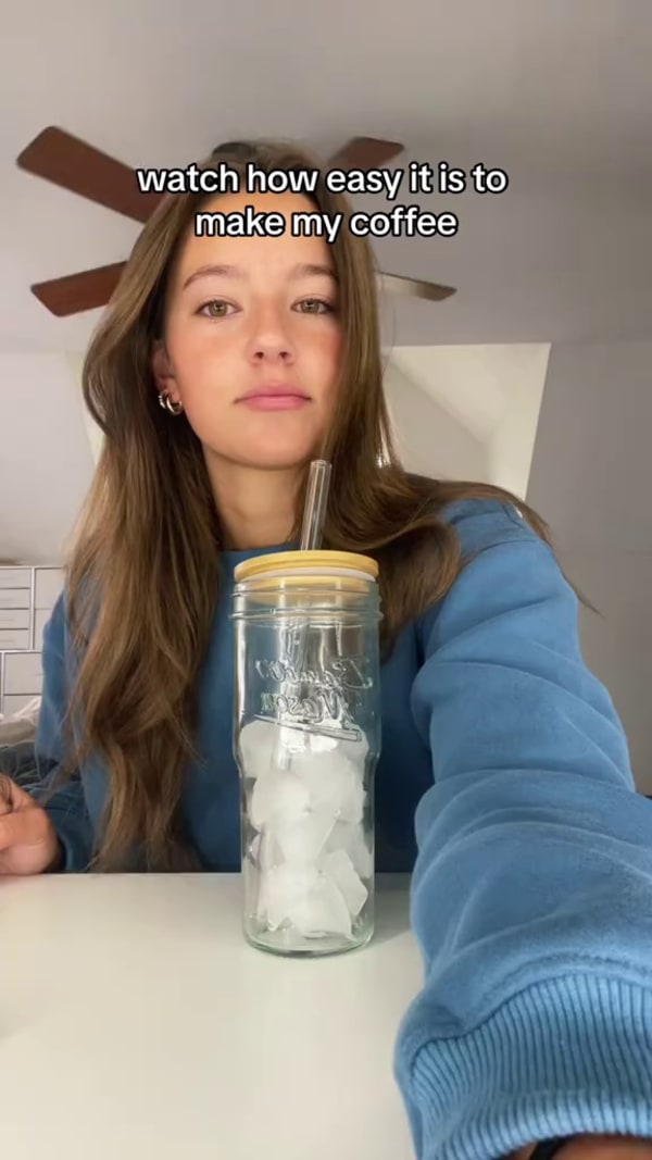 Customer making a coffee with Javvy Syrup
