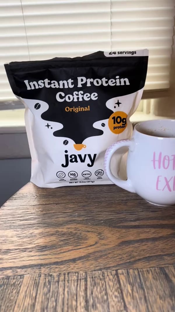 Customer making a coffee with Javvy Syrup