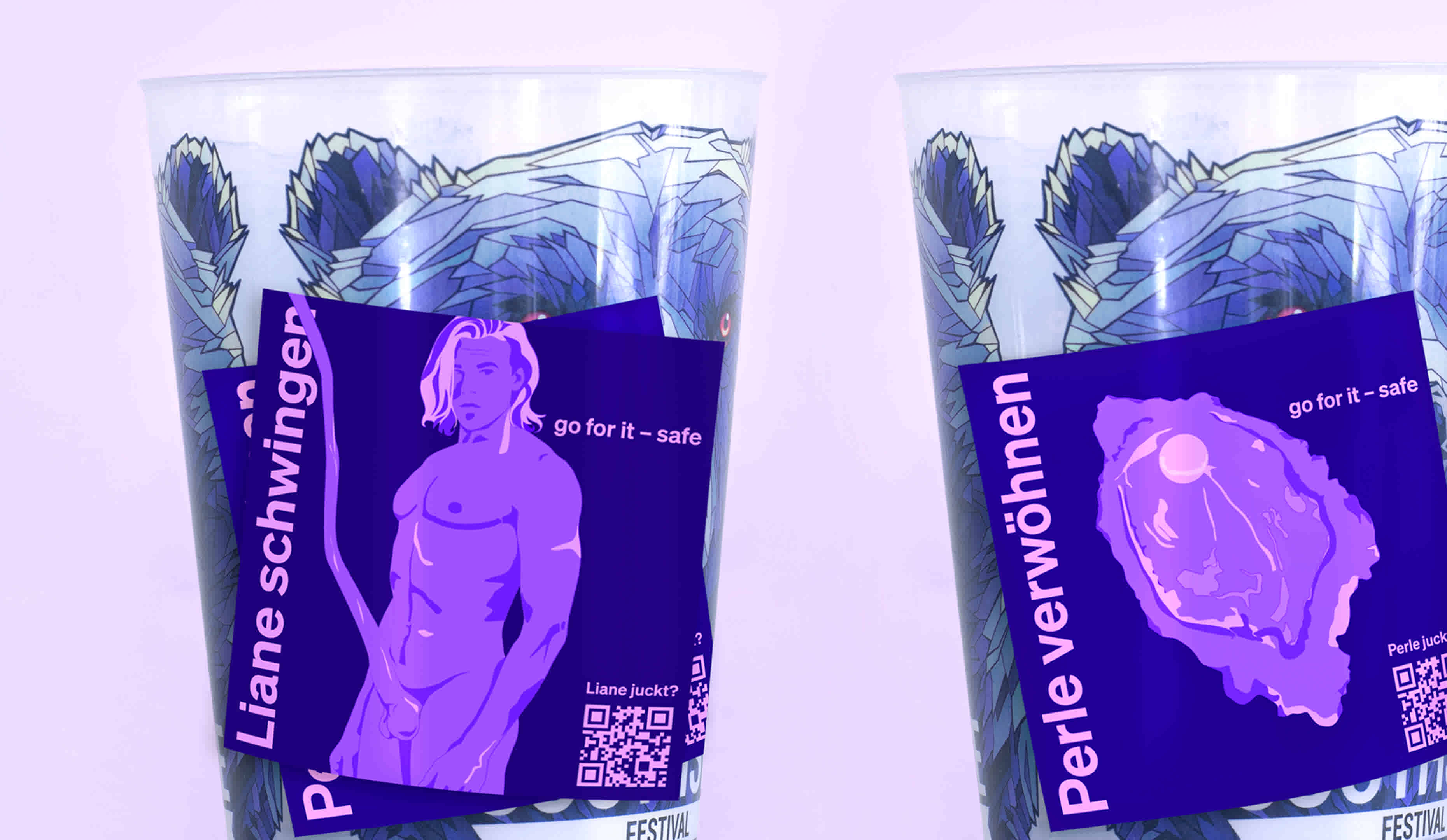 Two different stickers for the Volcano Fever campaign are stuck on two festival cups. They show abstract graphics for the male and female genital area.