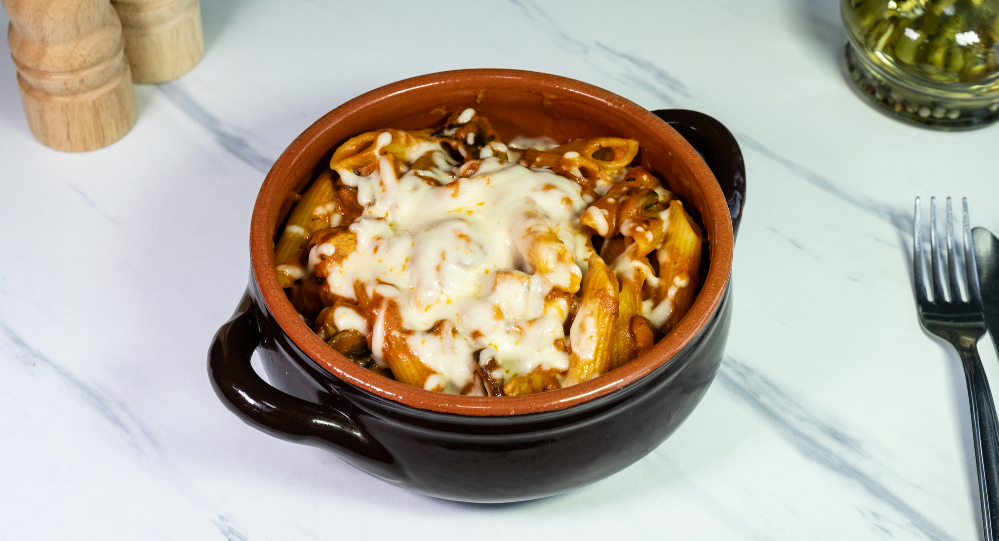 Imagine din meniu cu Penne Siciliene gratinate