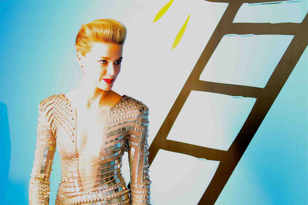 Woman in mirror-tile dress at Heaven Gala