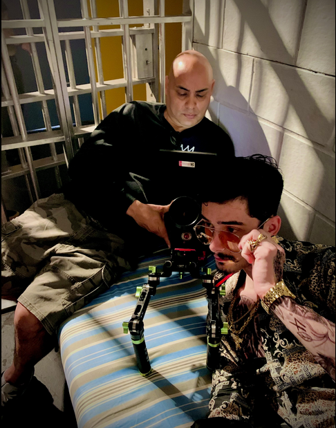 Carlos Azucena on set operating camera in tight space