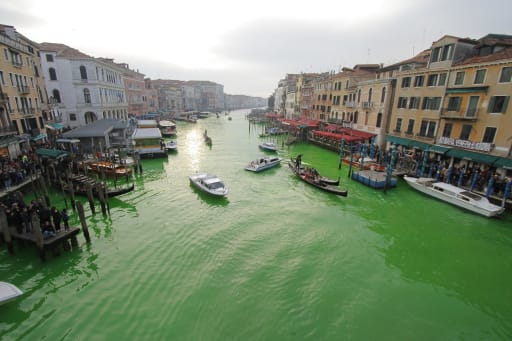 Italian climate change protesters turn Venice's Grand Canal green