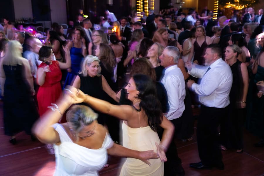 Packed dance floor at the end of the night at a Sydney corporate gala