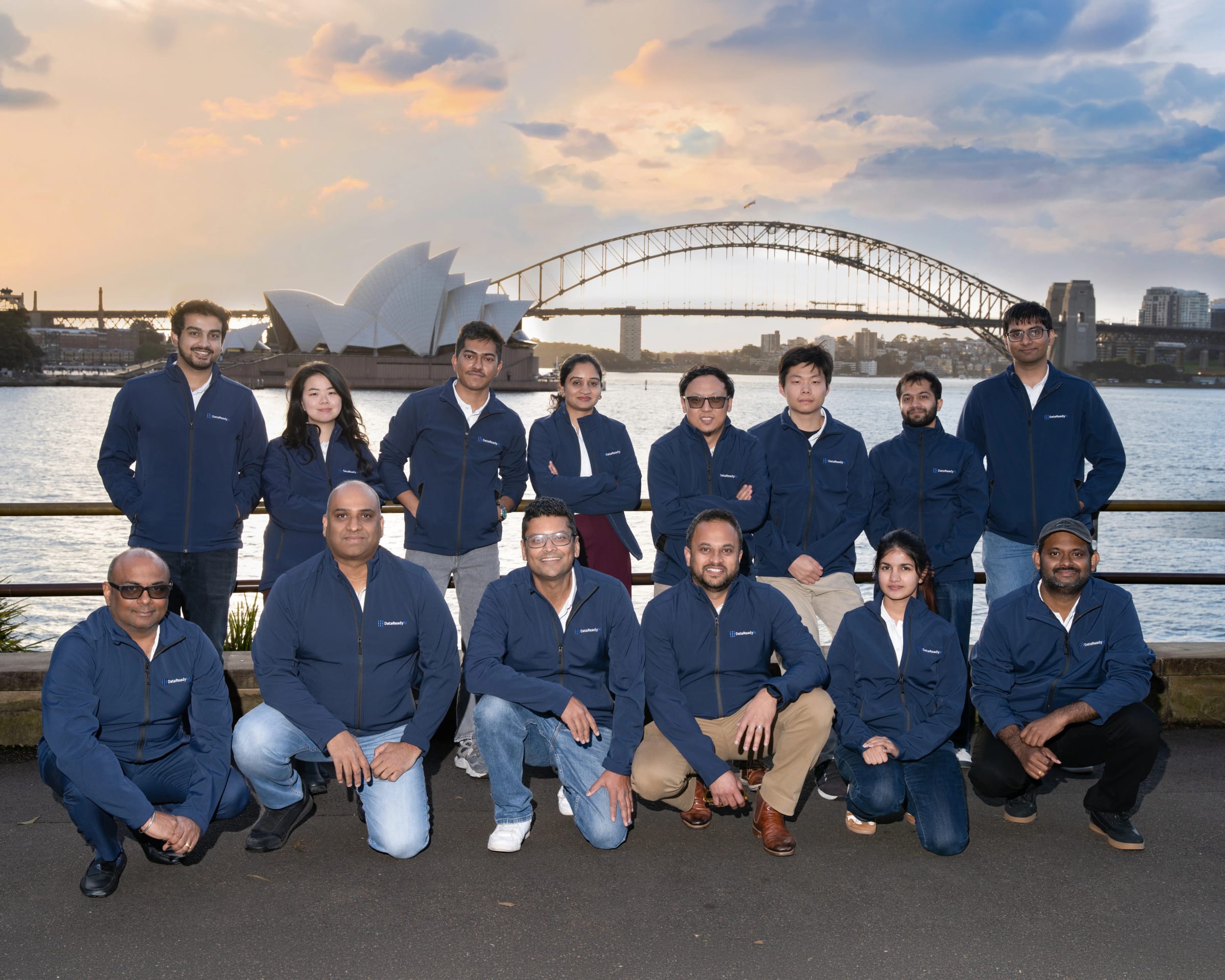 Corporate team photographed together in a professional group portrait in Sydney