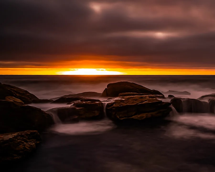 Sydney landscape — long exposure rocky coastline at sunset by Shekhar Jay Photography