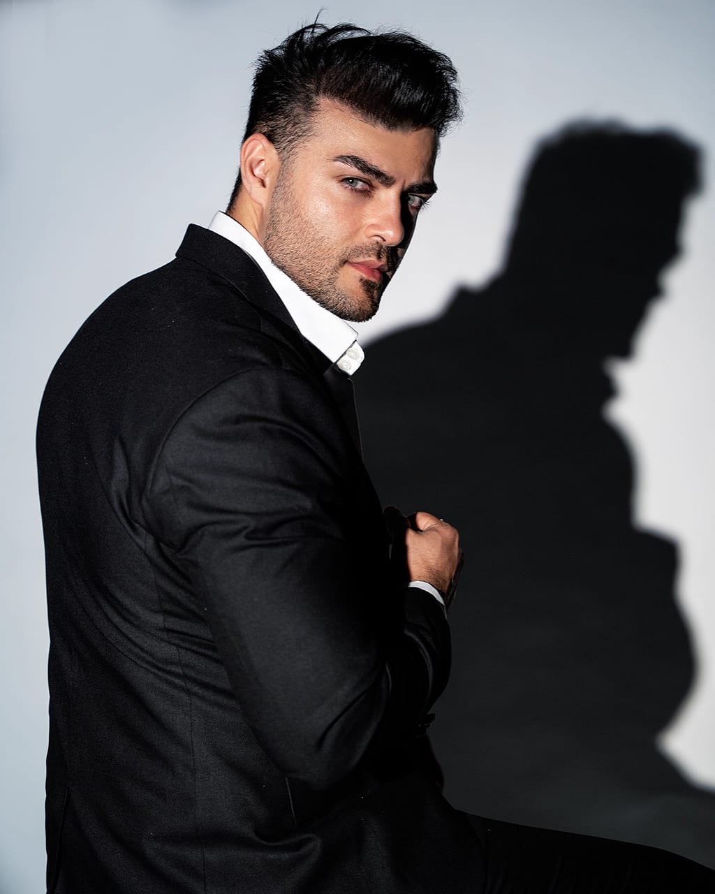 Sydney headshot photographer — male black suit side profile studio by Shekhar Jay Photography