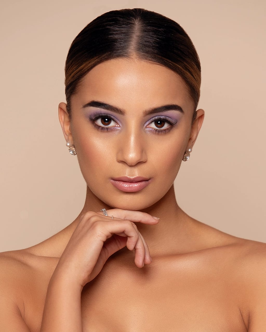 Sydney beauty headshot photographer — purple eyeshadow direct gaze by Shekhar Jay Photography