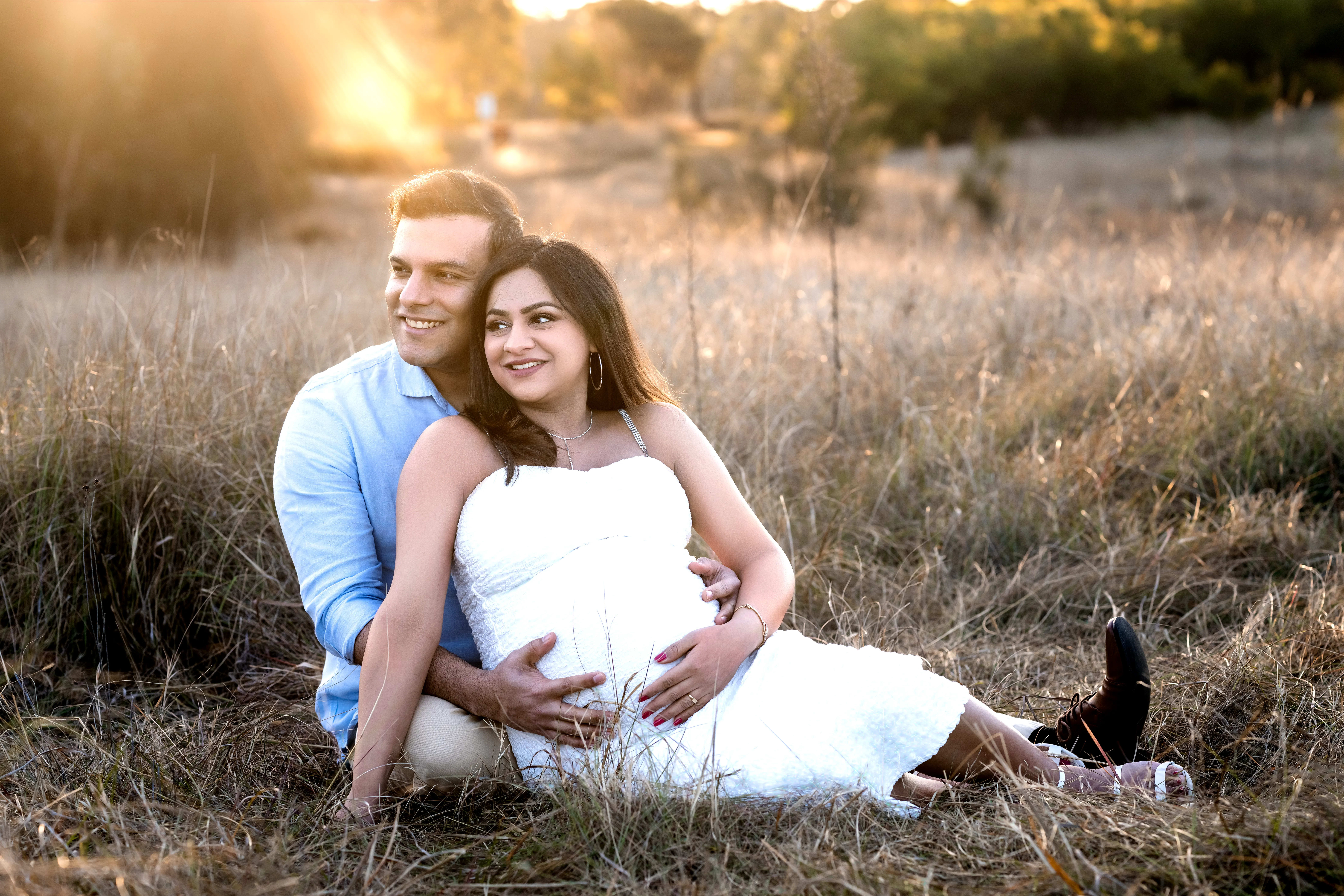 Best sunset photography locations Rouse Hill — couple golden hour field by Shekhar Jay Photography