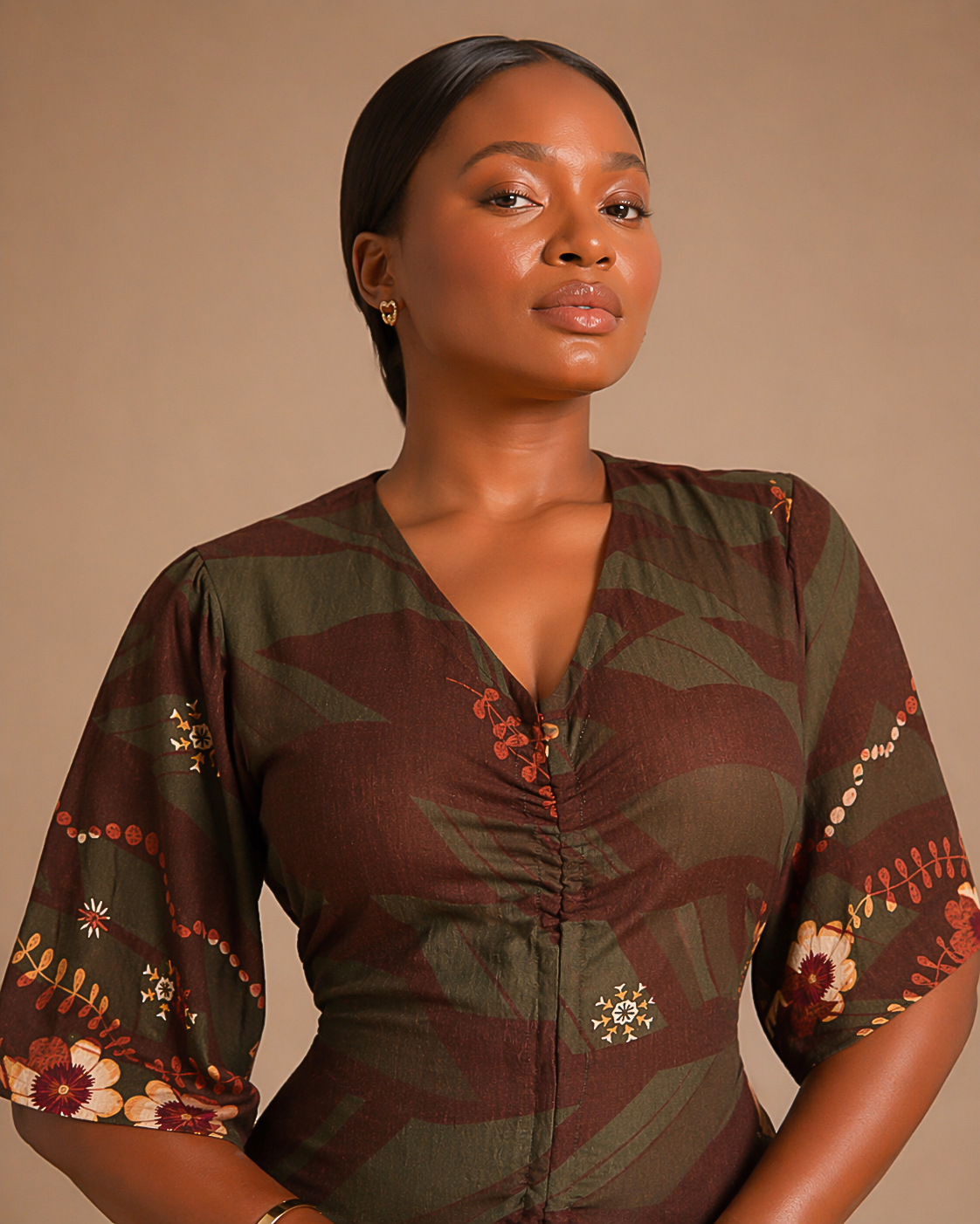 model in straight floral dress