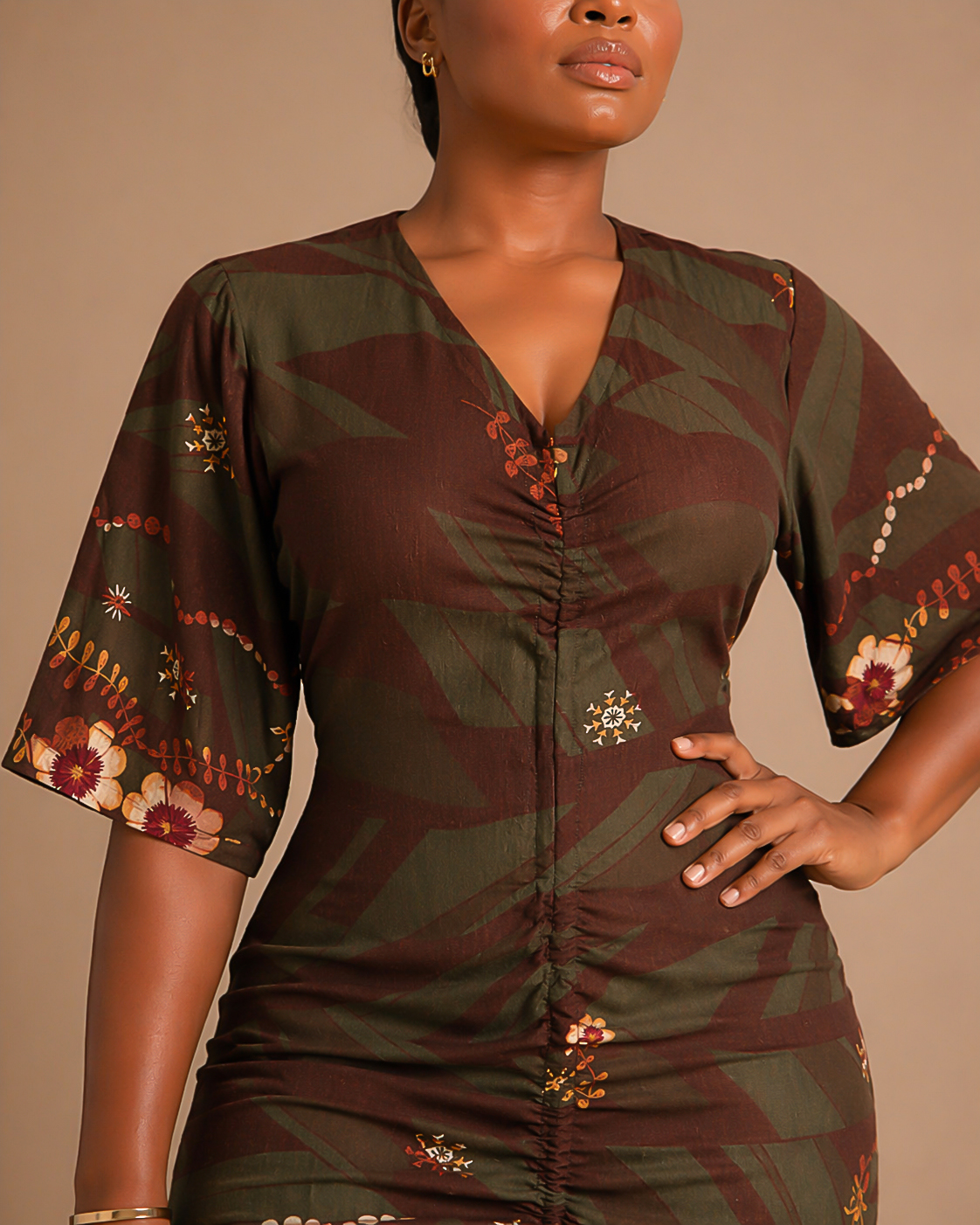 model in straight floral dress