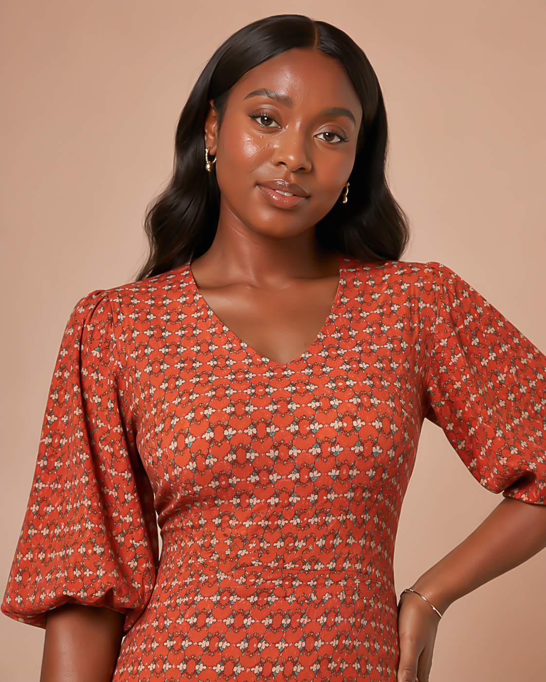model in straight floral dress