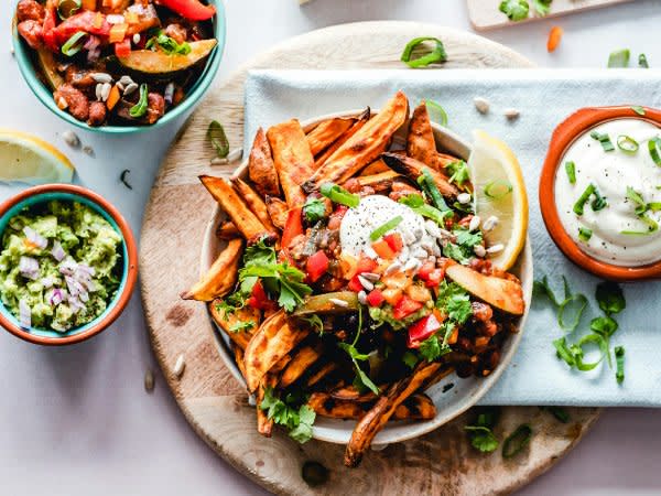 Vegan Sweet Potato Loaded Fries with Chili and Guacamole