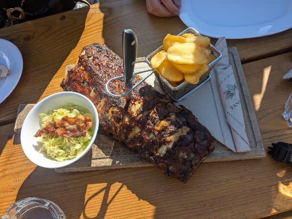 Slow-Roasted BBQ Spare Ribs with Crispy Potato Wedges and Bacon Slaw