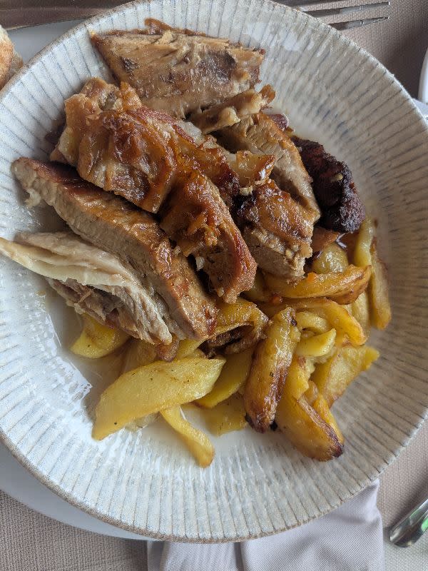 Slow-roasted pork with rustic potatoes