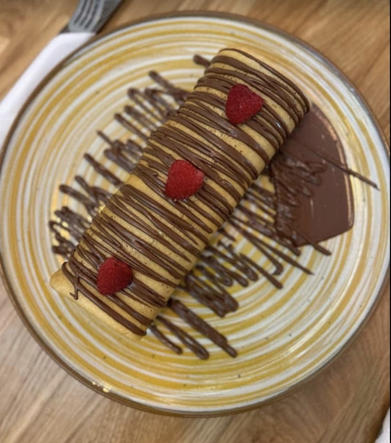 Chocolate Drizzled Crepe Roll with Raspberries