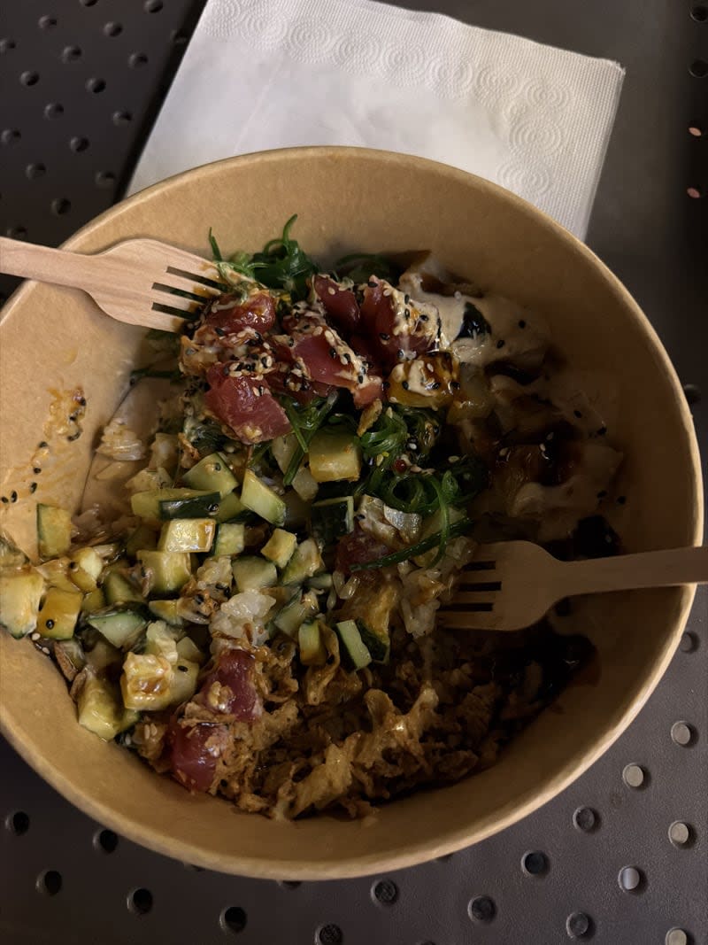 Tuna poke bowl with seaweed salad and crispy onions