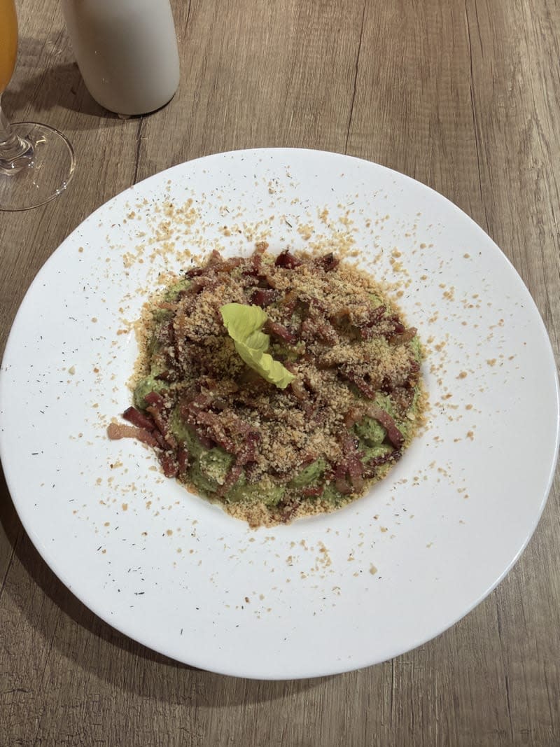 Creamy pesto pasta with crispy pancetta and toasted breadcrumbs