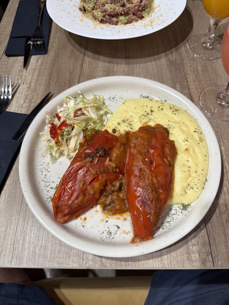 Stuffed red peppers with mashed potatoes and cabbage slaw