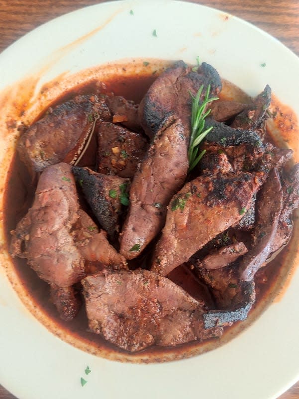 Pan-seared lamb liver with red wine and rosemary sauce
