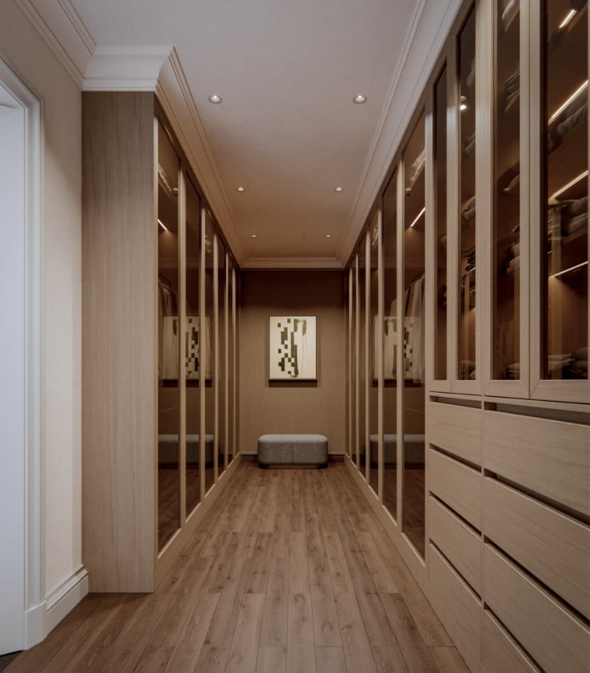 Custom walk-in closet hallway at The George with built-in wardrobes in warm white oak, brass hardware, and a softly lit dressing corridor