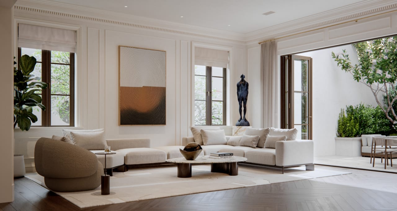 Spacious living room with natural light and curated furnishings at The George