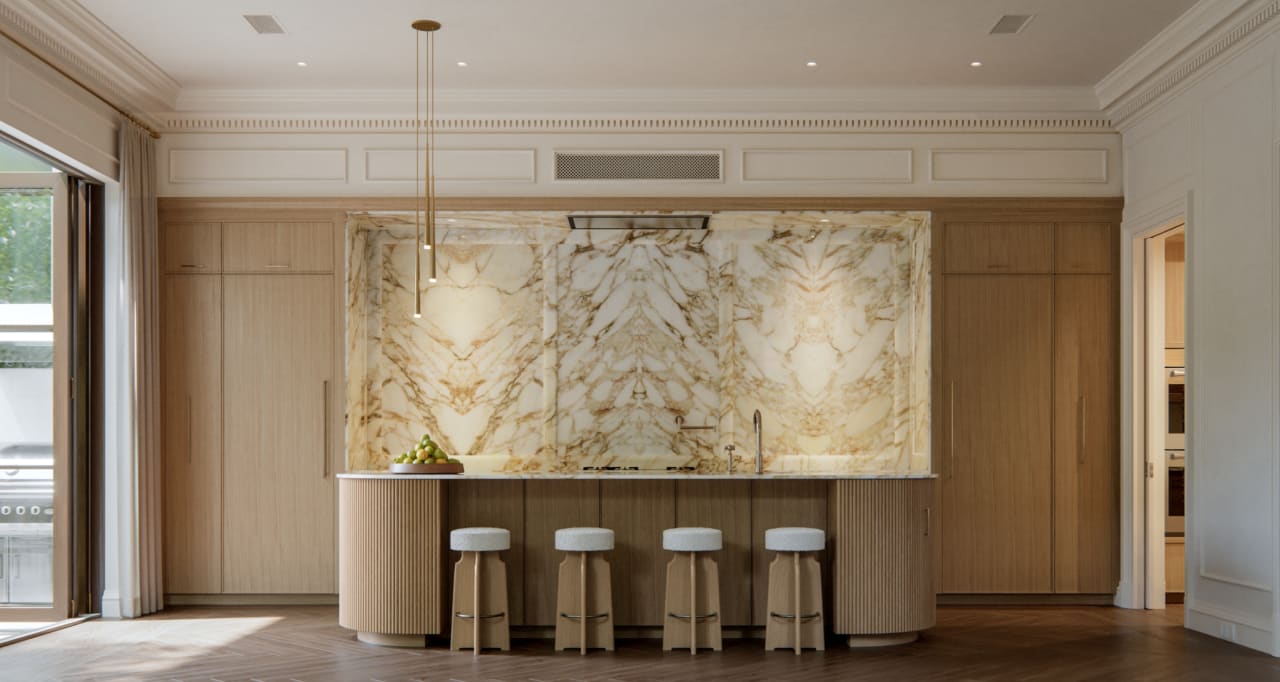 Main kitchen with marble island and statement backsplash at The George