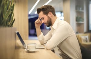 man tying to power nap