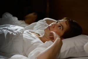 Woman with insomnia can not sleep at night