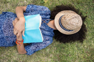 Young woman napping in park