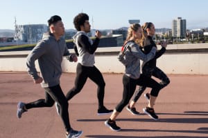 group of friends working out in the city