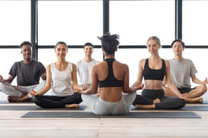 workout Class Having Group Yoga Lesson