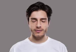 man happily having a lucid dream