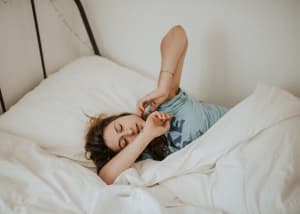 woman-waking-up-tied-stretching